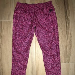 Kids large Nike pink/black printed leggings!!